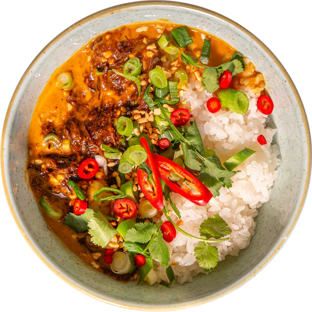 Beef massaman with rice, red chilli and coriander