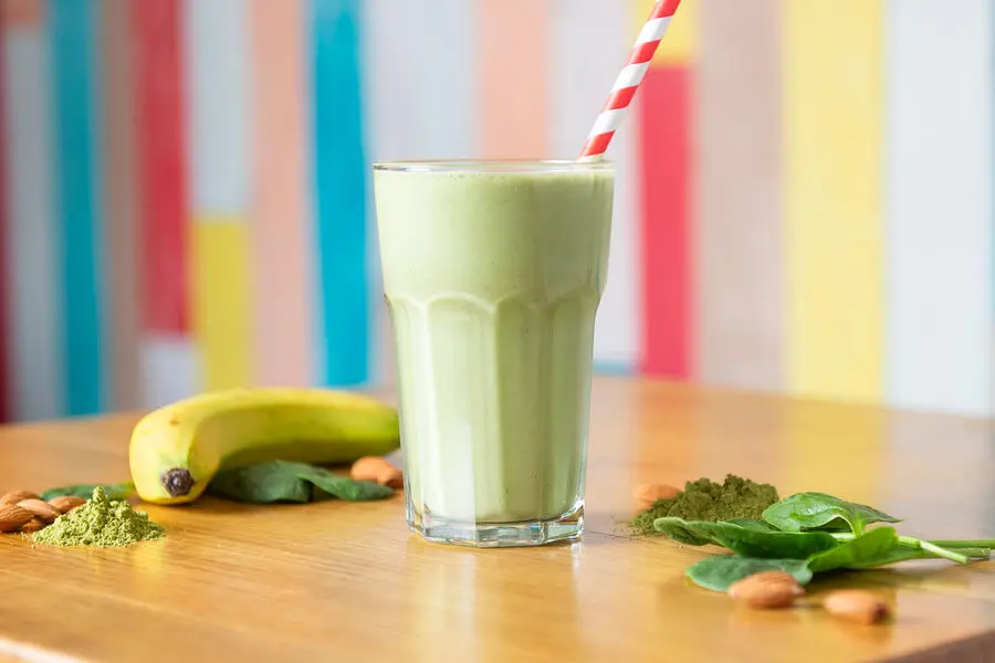 Matcha protein shake with banana and spinach